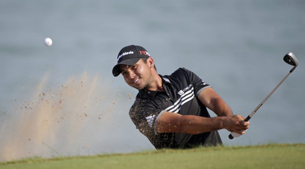 Jason Day, of Australia, hits out of a bunker on the 12th hole during the fourth round of the PGA Championship golf tournament Sunday, Aug. 16, 2015, at Whistling Straits in Haven, Wis. (AP Photo/Jae Hong)